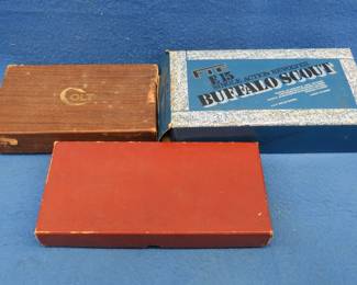 Lot 365. Three gun boxes in fair condition including one Colt