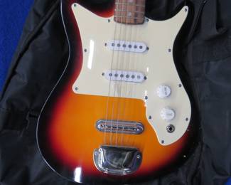 Lot 16. Harmony Model 02815 electric guitar.  Includes soft case.