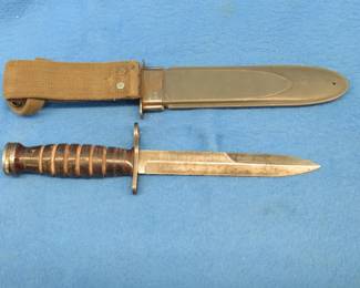 Lot 17. U.S. Navy MK 2,  6 1/2" bladed knife with metal sheath marked Nord-4723 B.M. Co. VP