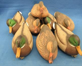 Lot 373. Three drake and three hen mallard decoys that appear unused.