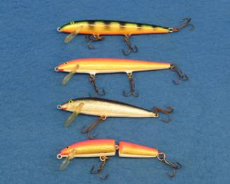 Lot 75. Four vintage Rapala baits