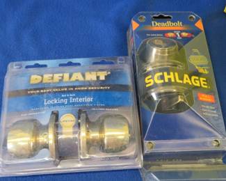Lot 309. Interior door knobs and a deadbolt