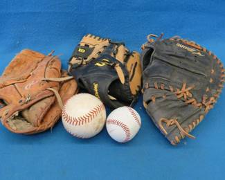 Lot 344. Baseball gloves and balls