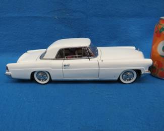 Lot 156. Road Signature 1956 Lincoln Continental Mark II.&nbsp; 1:18 scale die-cast car.&nbsp; Includes plastic display