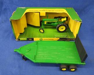 Lot 352. Ertl Tractor with implement trailer 1:16 scale die-cast