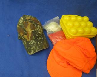 Lot 22. Hunting hats, tree stand harness, and more