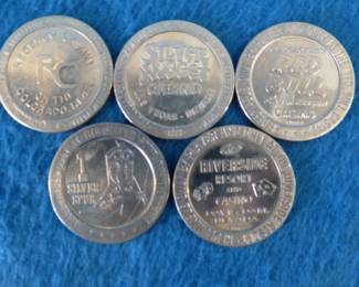 Lot 303. Five old casino tokens.&nbsp; Many are from closed casinos.