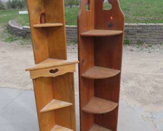 Lot 281. Two wooden corner shelves