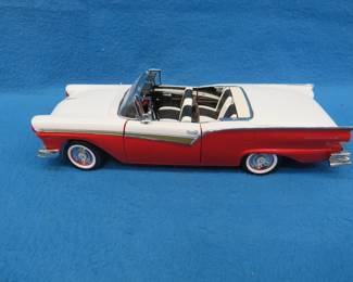 Lot 192. Sun Star 1957 Ford Fairlane 500 Skyliner Hardtop/Convertible. 1:18 scale die-cast car. Hinge is broken on hardtop