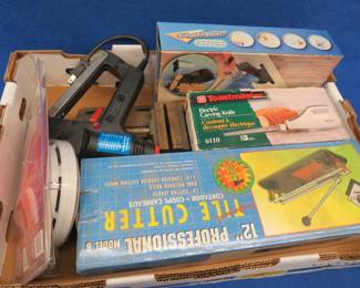 Lot 340. Tile cutter, electric stapler, vice, and more