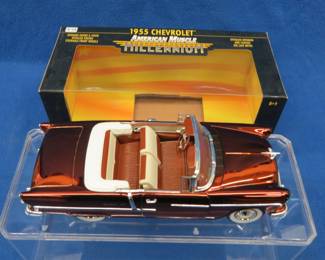 Lot 355. Ertl American Muscle Millennium 1955 Chevrolet 1:18 scale die-cast with original box and a plastic display box