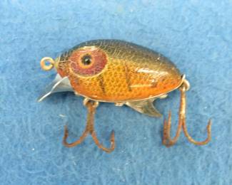 Lot 77. Vintage 1 3/4" wooden Clark Water Scout