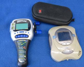 Lot 306. Old hand-held fishing game and a video player, both are untested