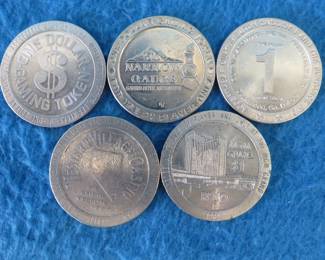 Lot 305. Five old casino tokens.&nbsp; Many are from closed casinos.