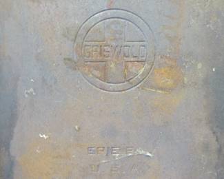 Lot 343. Griswold griddle with broken bottom rim, see pictures
