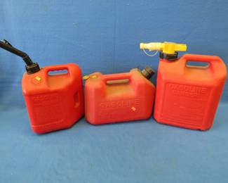 Lot 311. Three 2 1/2 gallon plastic fuel containers