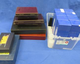 Lot 59. Coin display boxes and cases, coin tubes, and more