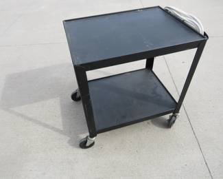 Lot 261. Rolling cart with power strip