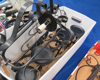 Lot 322. Candle holders and a lamp