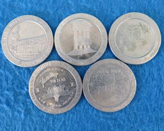 Lot 302. Five old casino tokens.&nbsp; Many are from closed casinos.
