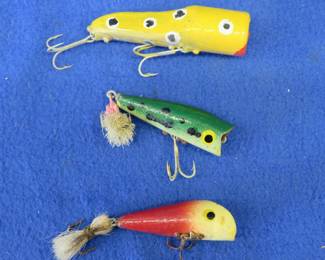 Lot 258. Three vintage folk art wooden artisan-made and hand-painted plunker-style baits one 3 3/8", and two at 2 1/2" each
