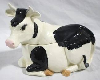 251 - Cow laying down cookie jar, 12 x 9
