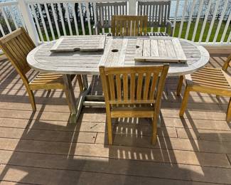 Gloster teak outdoor table and chairs