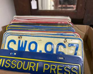 license plates, many old ones