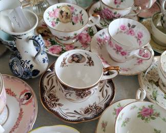 Collectible teacup saucers vases and more