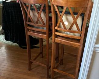 Two wood bar chairs