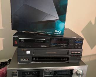 Sony BDP-S1200 Blu-ray Disc/DVD Player (New in Box), Sony CDP-30 Compact Disc Player, Funai VHS Video Cassette Recorder & Teac V-44C Stereo Cassette Deck