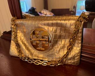 Women's Tory Burch Gold Leather Clutch