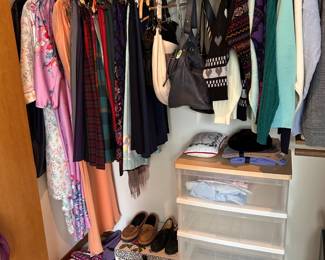 Closet full of all as-new sweaters, robes, skirts, pants, skirts, dresses shoes  size 9. 