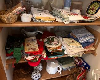All never used potholders, kitchen towels