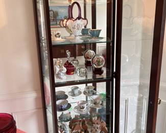 mirrored back display cabinet, Royal Doulton mugs, Fenton basket.