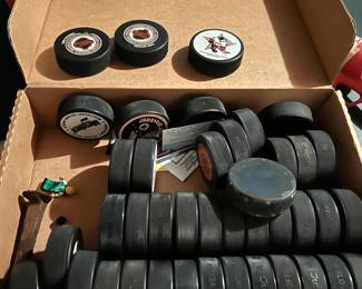 Tons of Hockey Pucks
