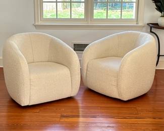PAIR OF ARHAUS "FRESNO" SWIVEL CLUB CHAIRS | Made in America, "burbank natural" wool upholstery, clean purchased by consigner one year ago. Original purchase price $2,000 each. -  l. 38 x w. 36 x h. 32 in