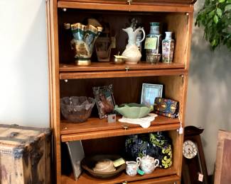 Bronze statuary antique wooden trunk designer purses pottery 