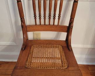 1 of 4 Cane Seat Chairs