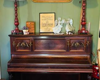 Closeup of Piano & Brass Candelabras 