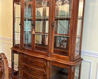 		#2	Michael Amini The La Francaise Collection 2 piece lighted china cabinet with curved glass. 71x18x89	 $225.00 							