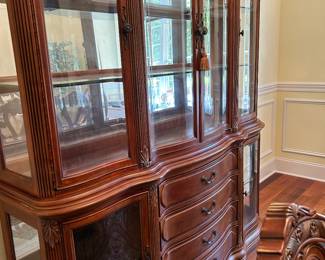 	#2	Michael Amini The La Francaise Collection 2 piece lighted china cabinet with curved glass. 71x18x89	 $225.00 				