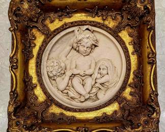 Ornate gilt framed marble relief scene of children. It is really hard to describe the beauty and Craftsmanship of something like this. It is almost other worldly. 