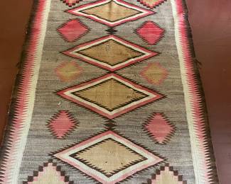 Several Navaho rugs