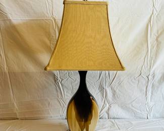 Vintage-Inspired Table Lamp with Unique Amber Glass Base and Decorative Finial