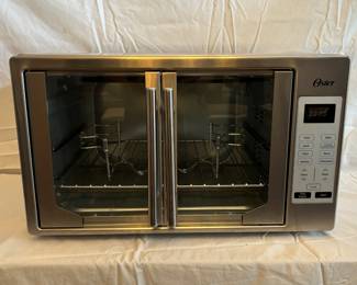 Oster Stainless Steel Countertop Toaster Oven - Digital Controls, Dual Doors, Includes Rack and Tray