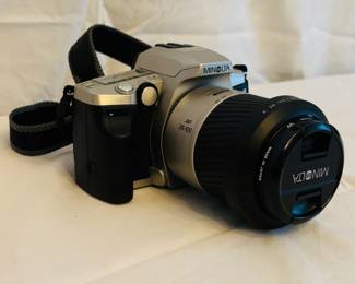 Vintage Minolta SLR Camera with Accessories and Carrying Case