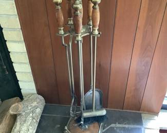 Brass and wood fireplace tools