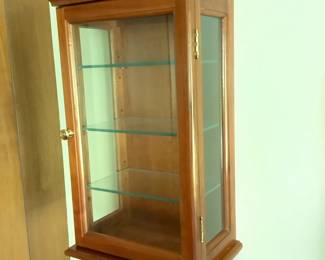 Handcrafted curio cabinet with glass shelves, sides and front