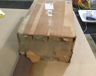 Box of dimensional teak lumber